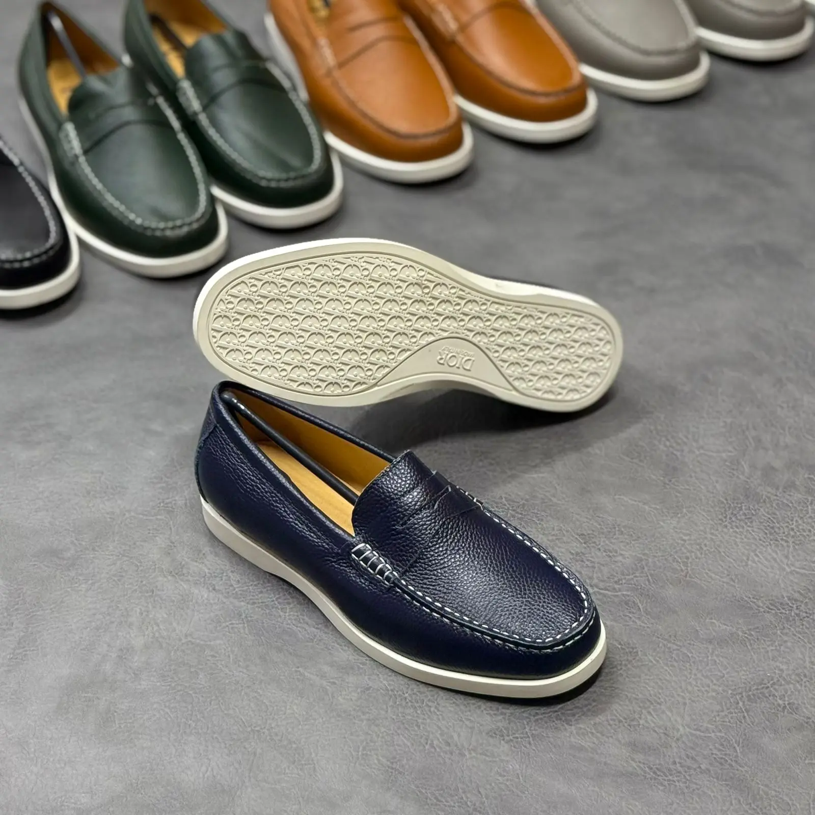 Navy pebble leather penny loafer